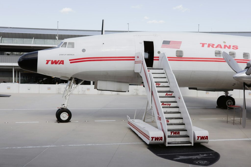 a large jetliner sitting on top of an airport tarmac